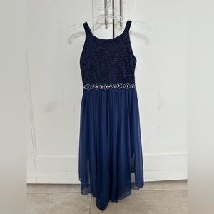 girls formal navy blue dress. Worn a few times but in good condition.